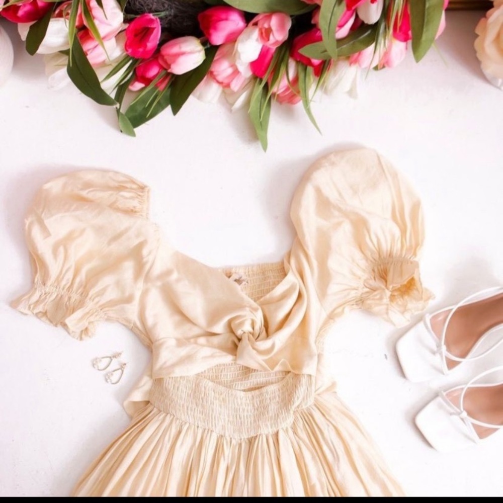 Cream maxi dress with cut out front